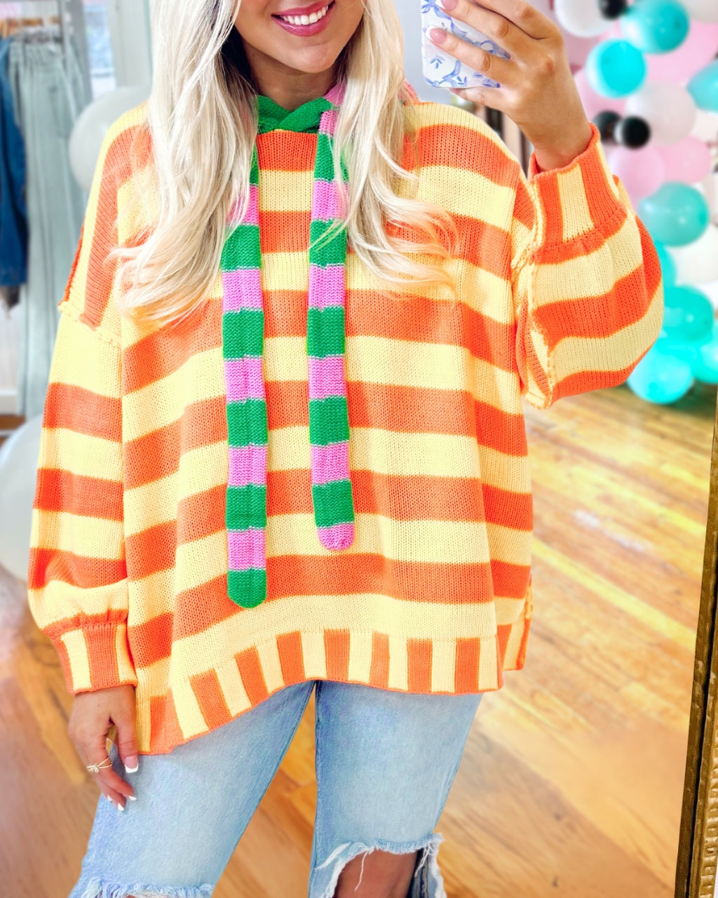 Vibrant Striped Hooded Sweater