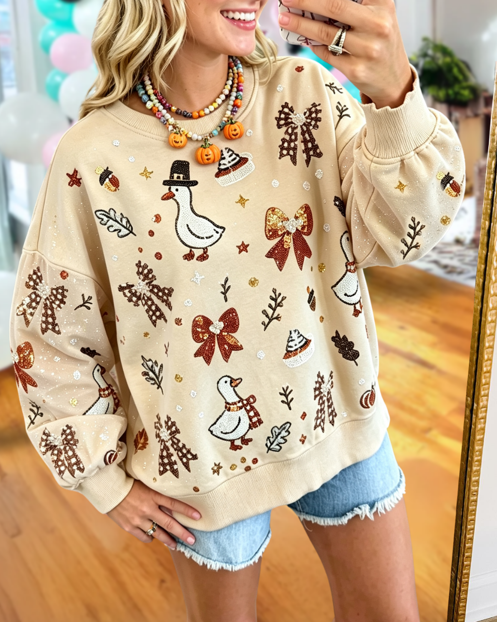 Snow Goose Sequin Bow Sweatshirt